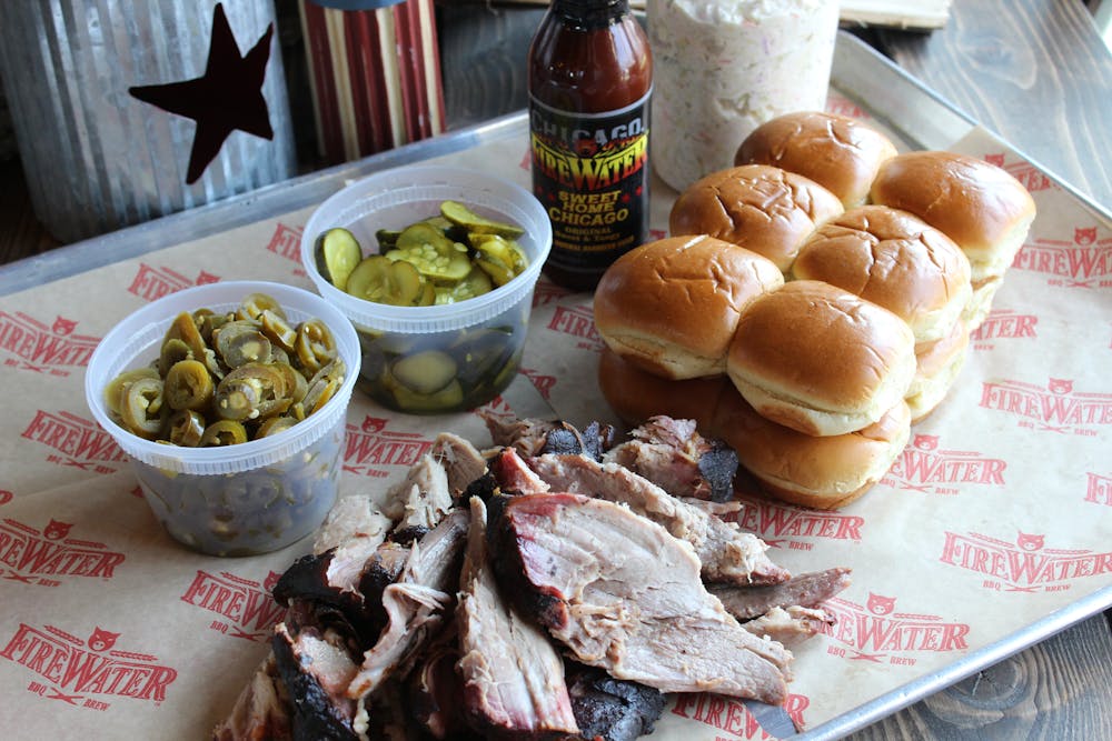 a sandwich sitting on top of a picnic table