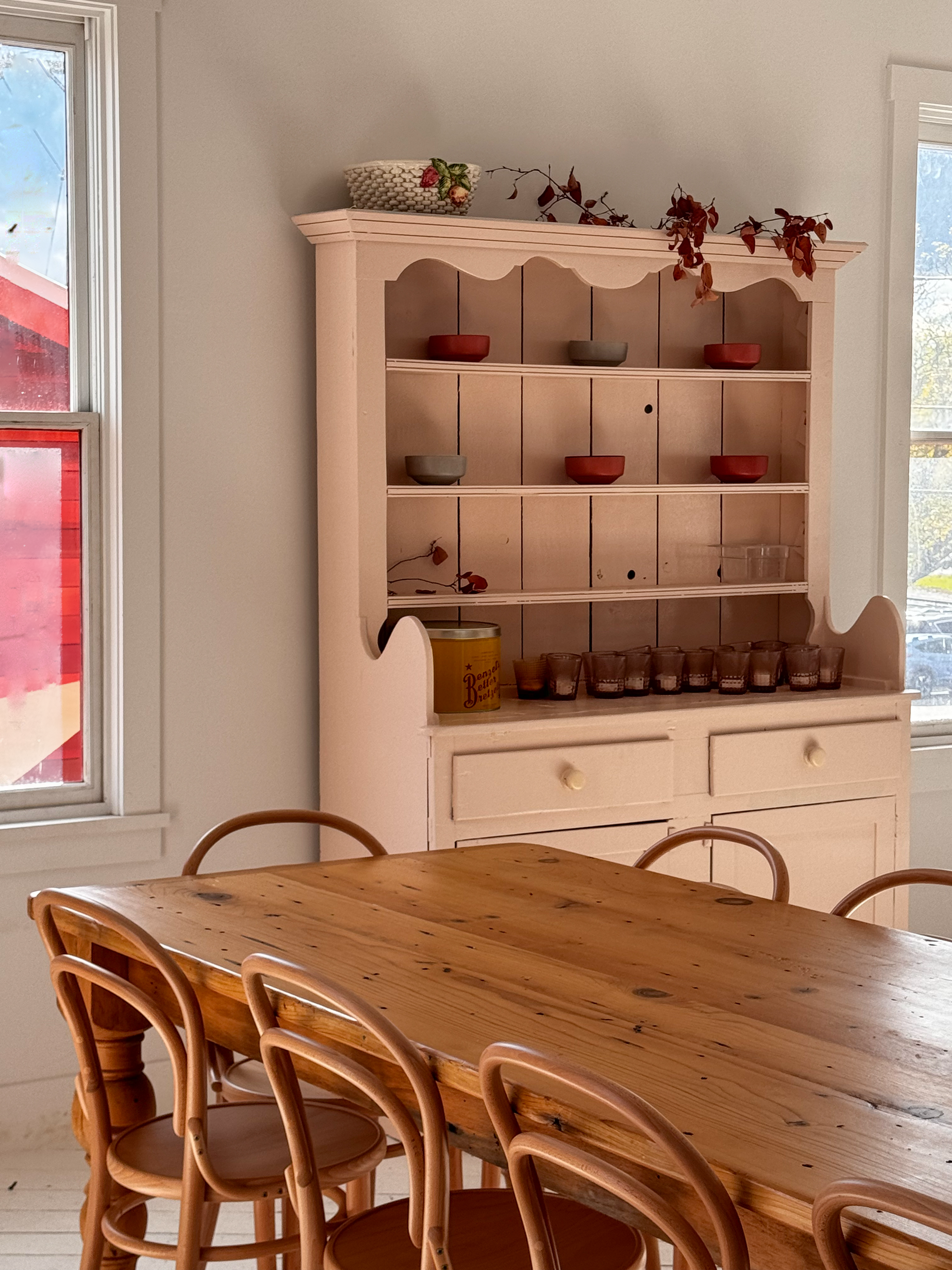 a bedroom with a wooden table