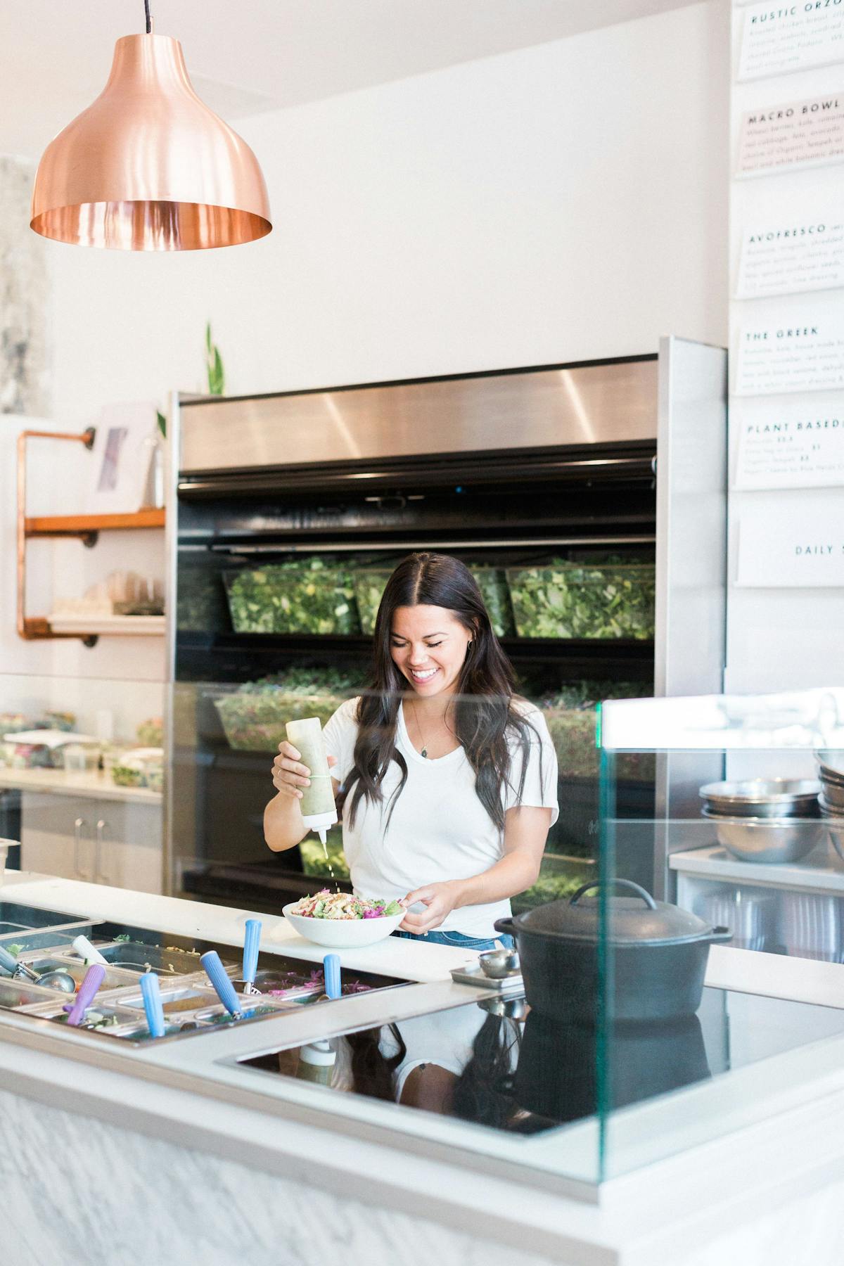 a person standing in a kitchen