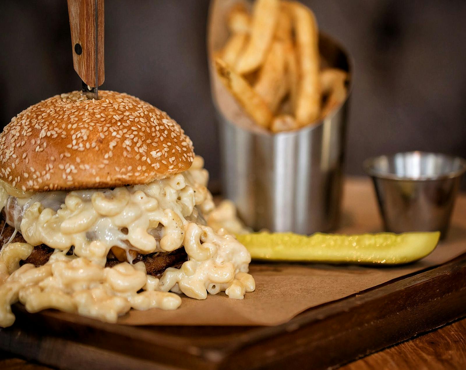 a sandwich sitting on top of a wooden table