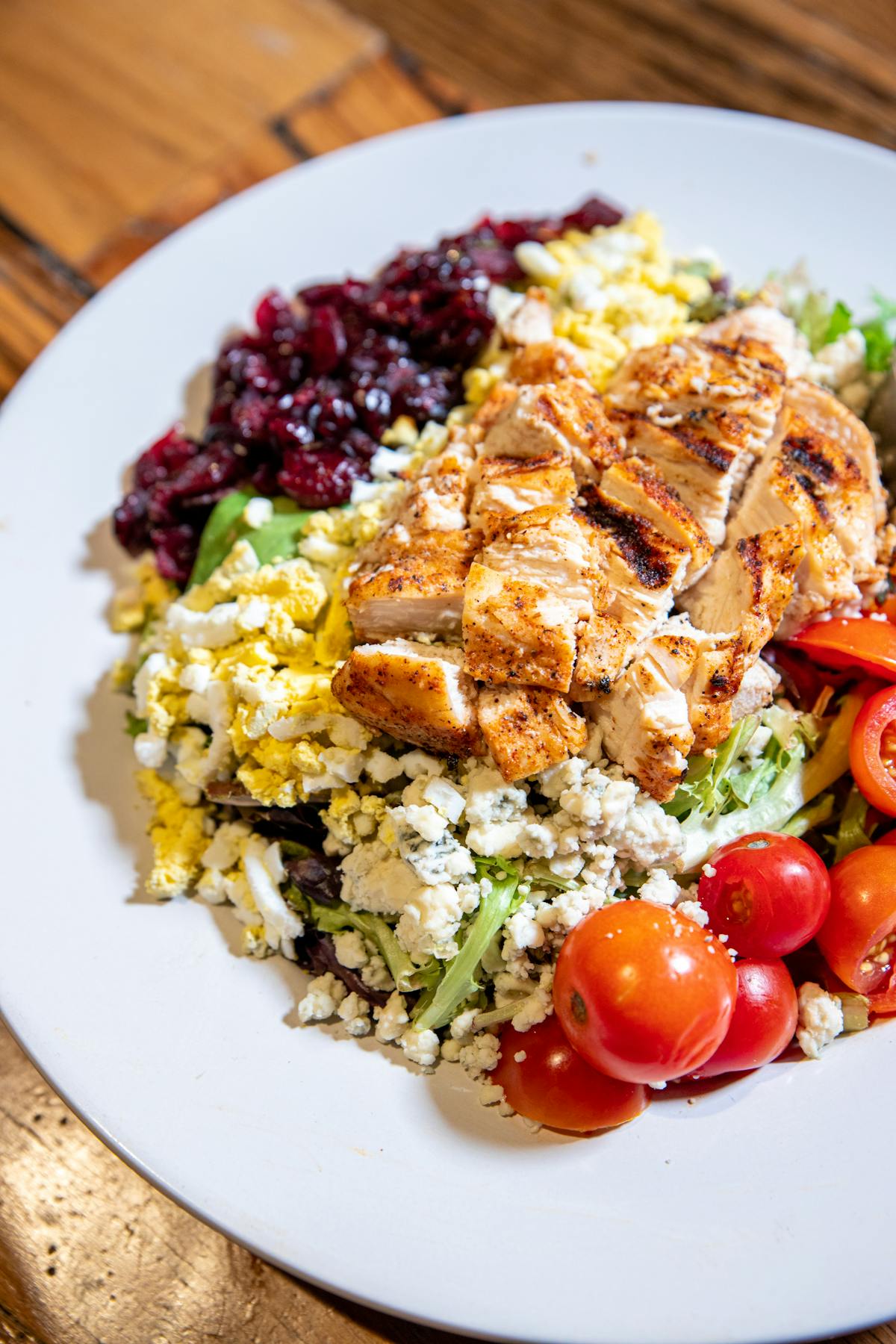 a plate of food with rice meat and vegetables