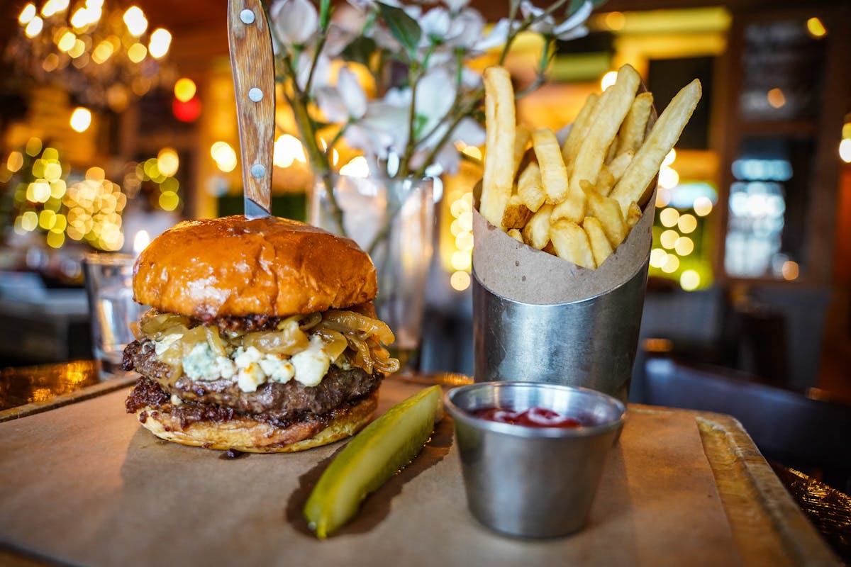 a sandwich sitting on top of a wooden table