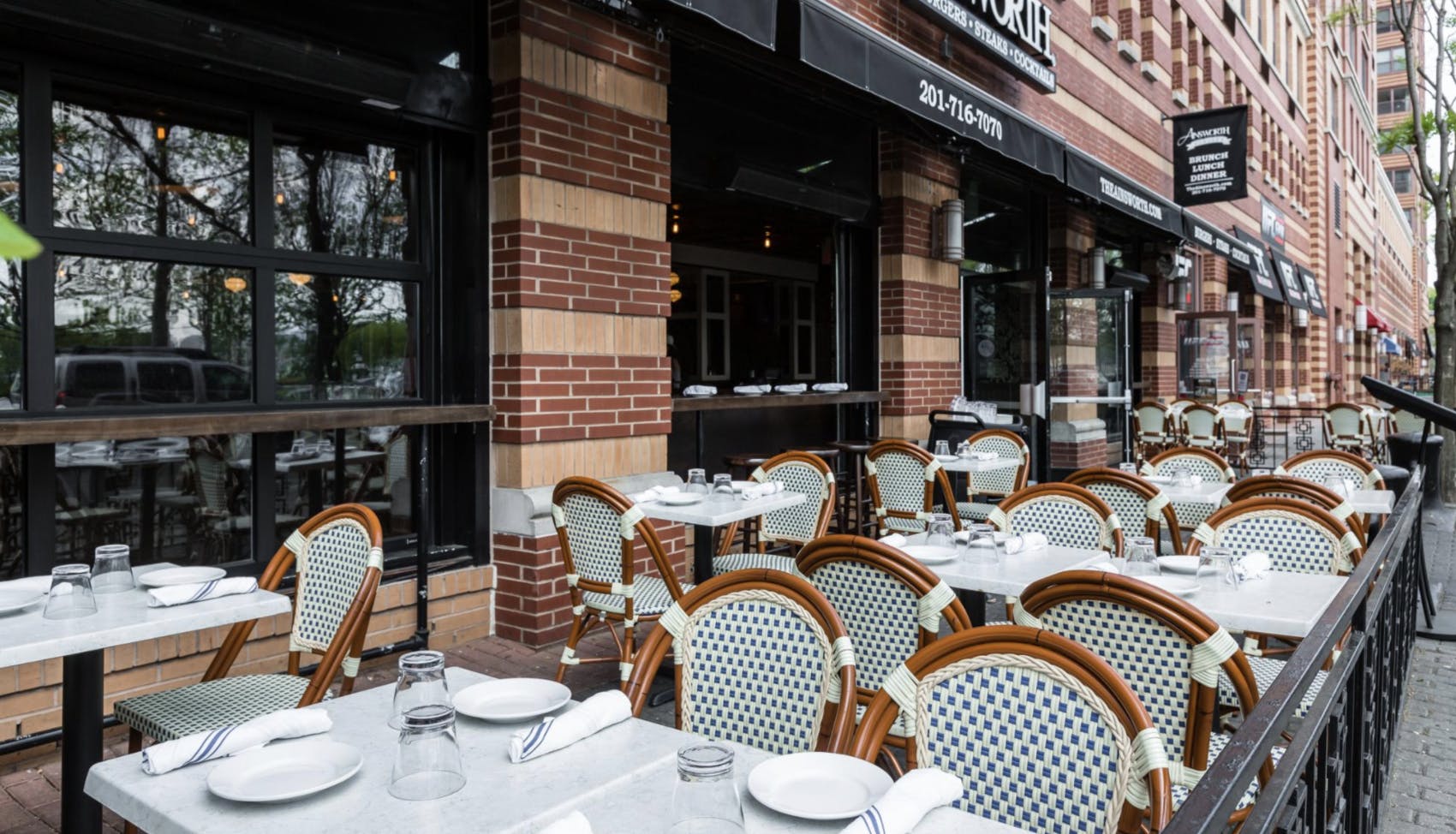 a dining room table in front of a building