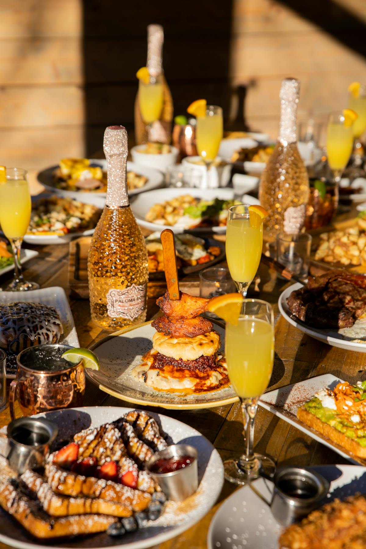 a table topped with plates of food