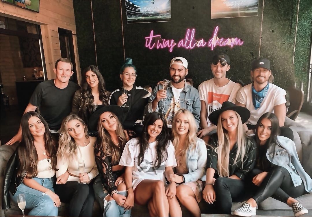 a group of people posing for a photo