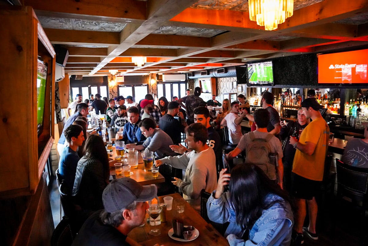 a group of people in a restaurant