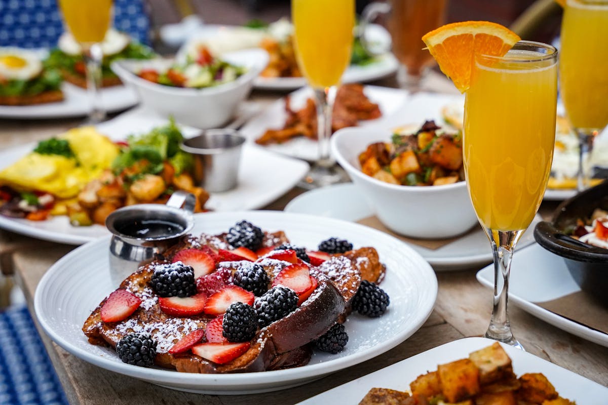 a table topped with plates of food on a plate