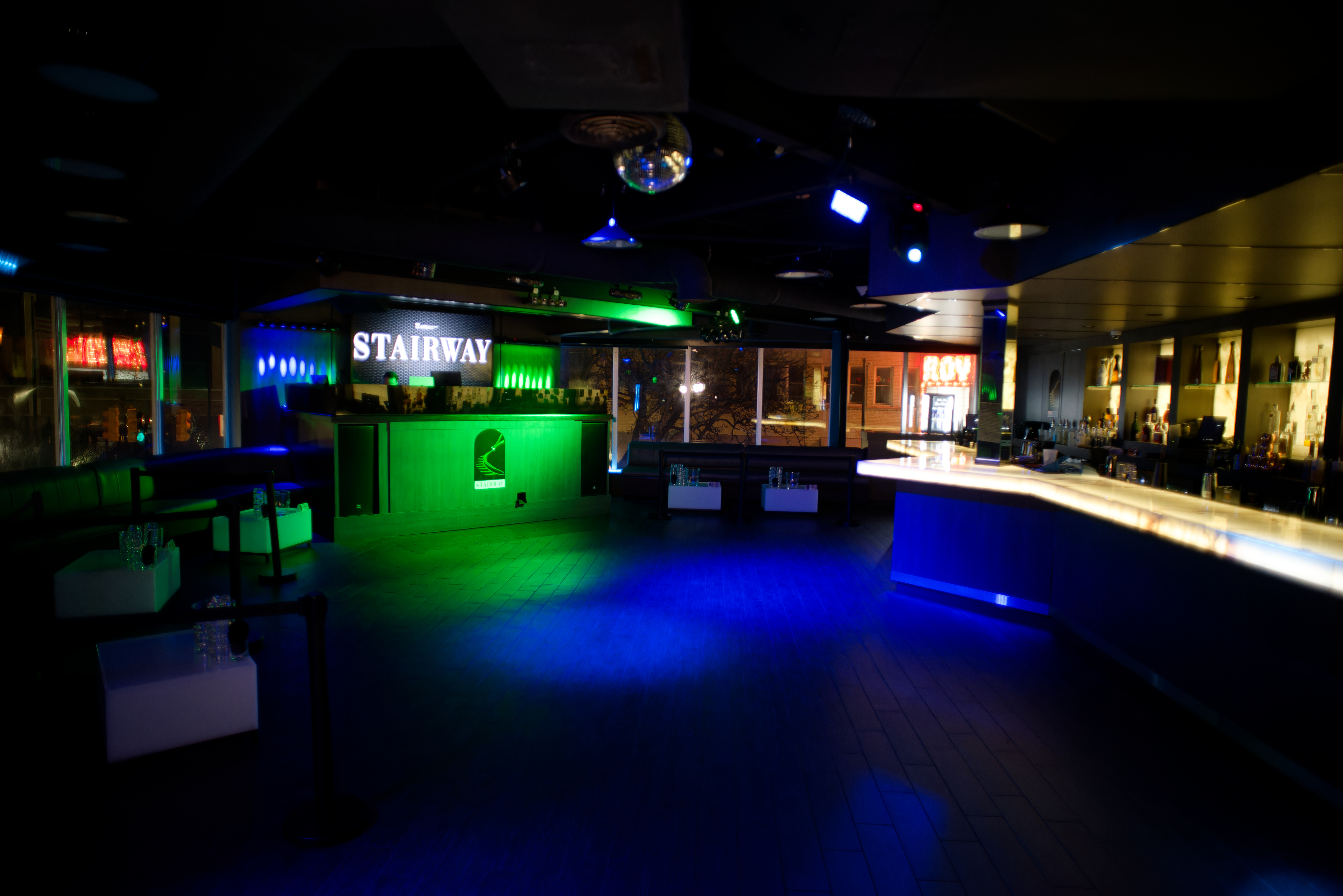 a group of people sitting at a train station