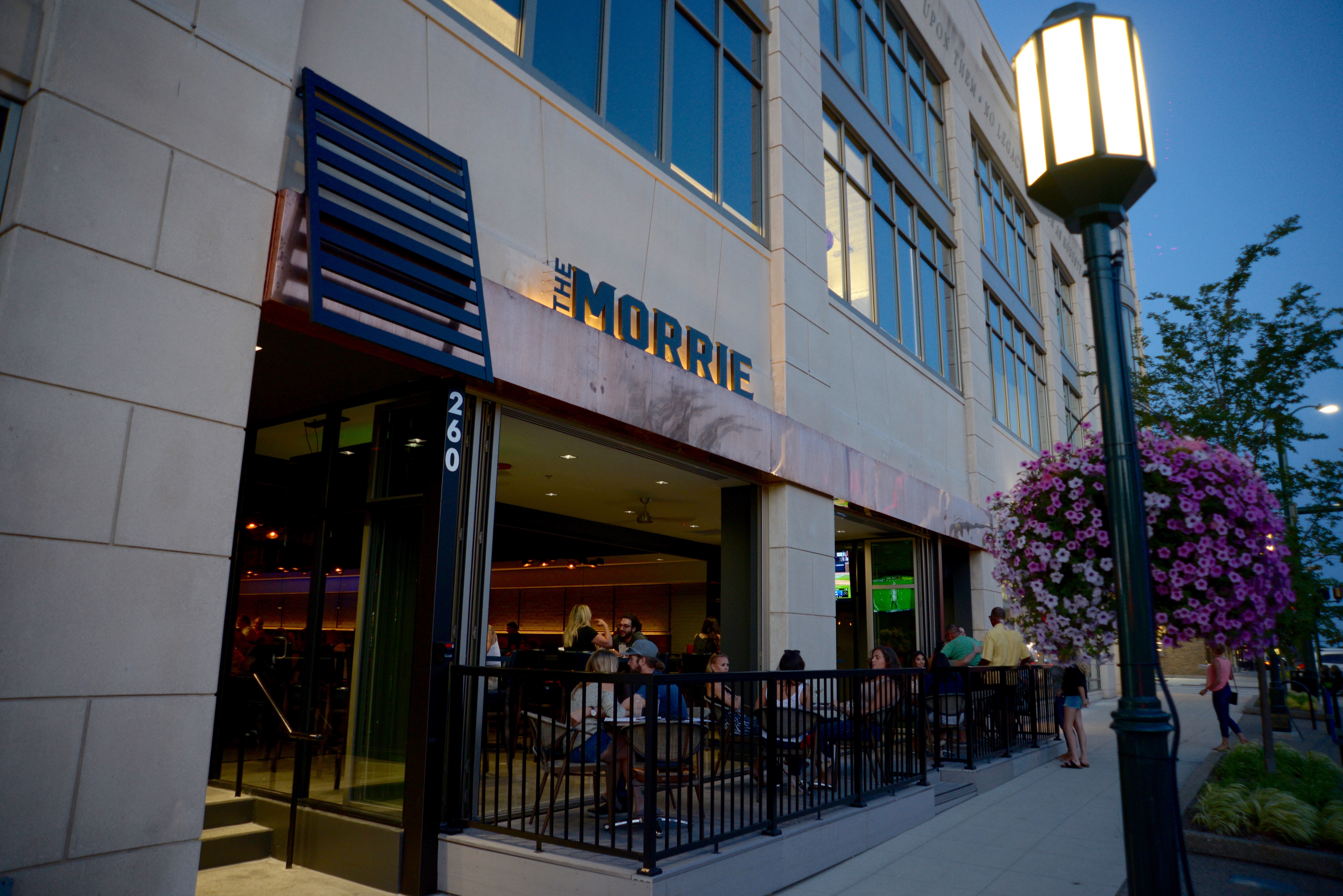 a building with a store on the corner of a street