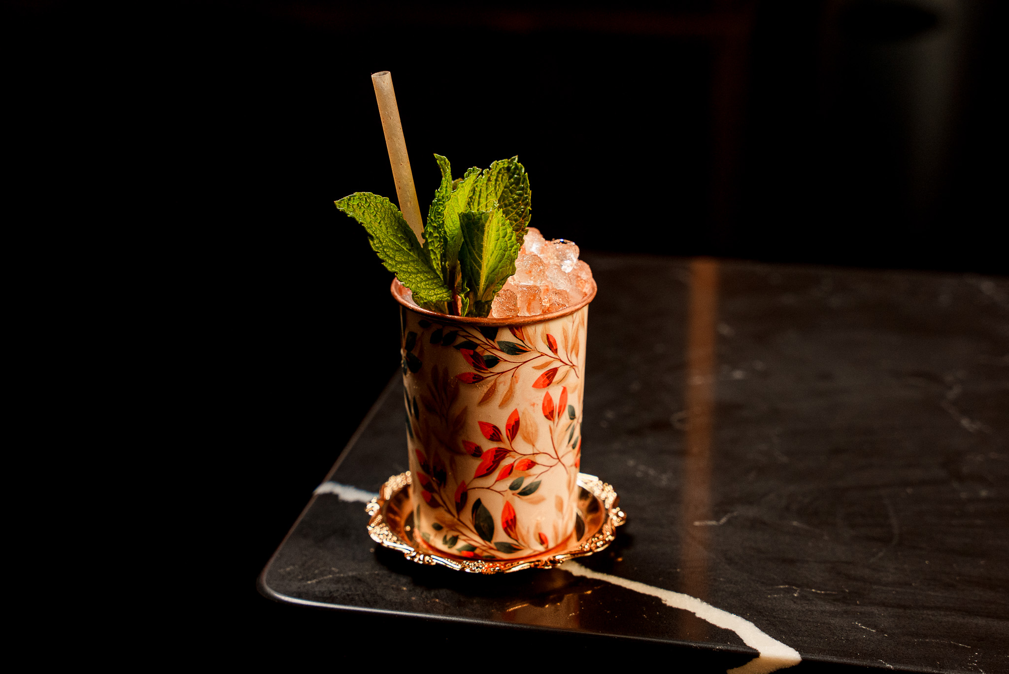 a vase filled with flowers sitting on a table