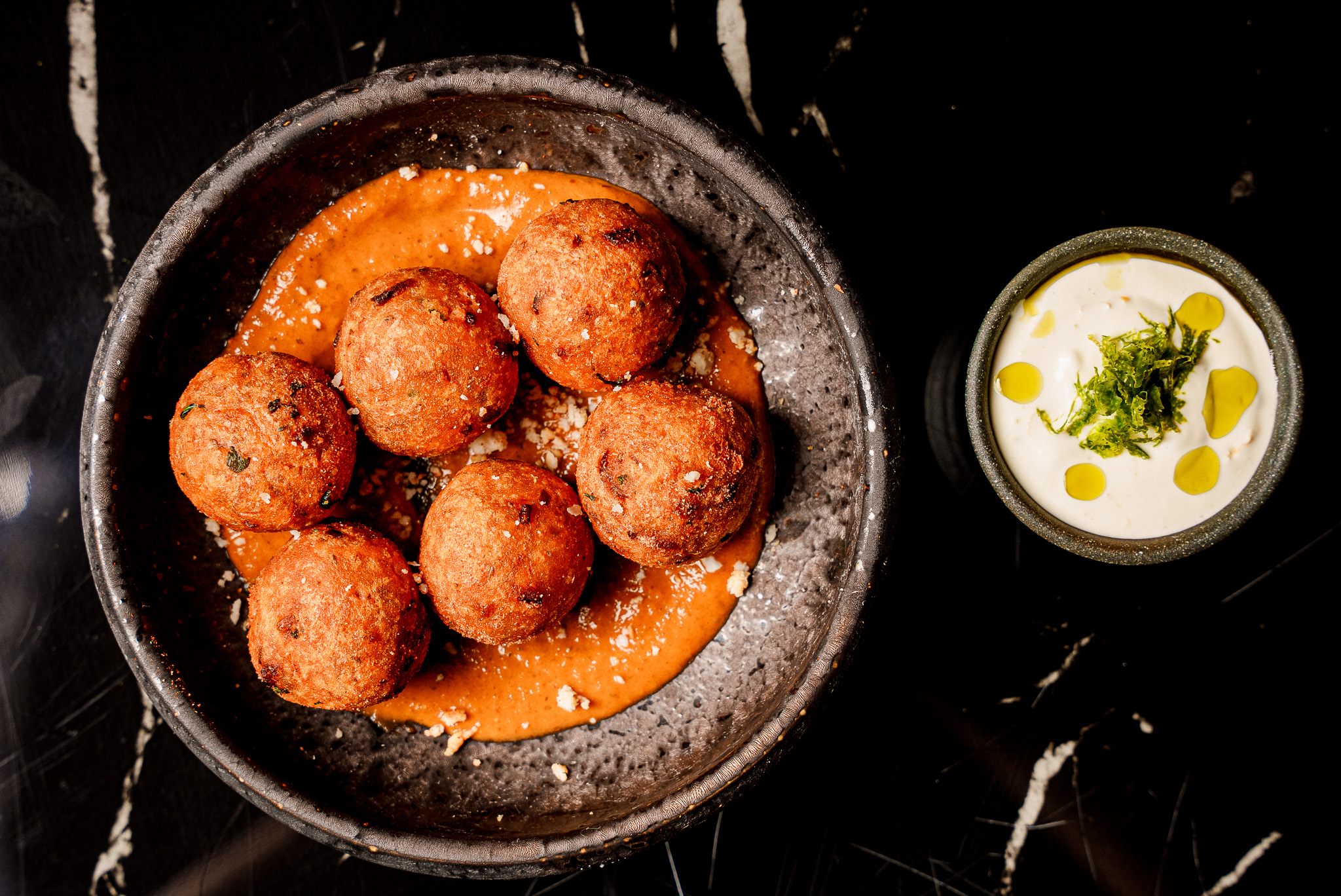 a pan of food on a grill