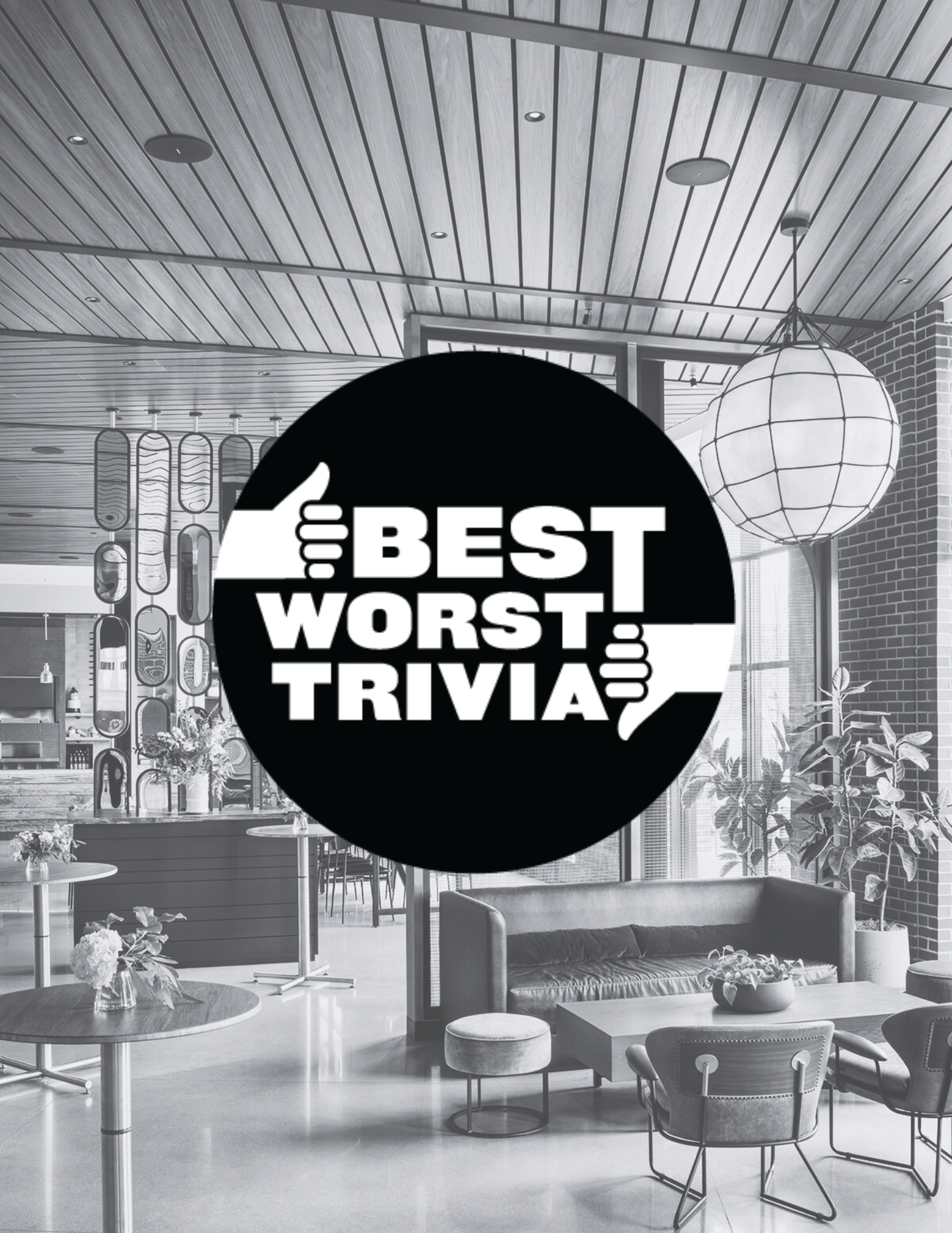 a room with a large round black circle and a black circle with white text