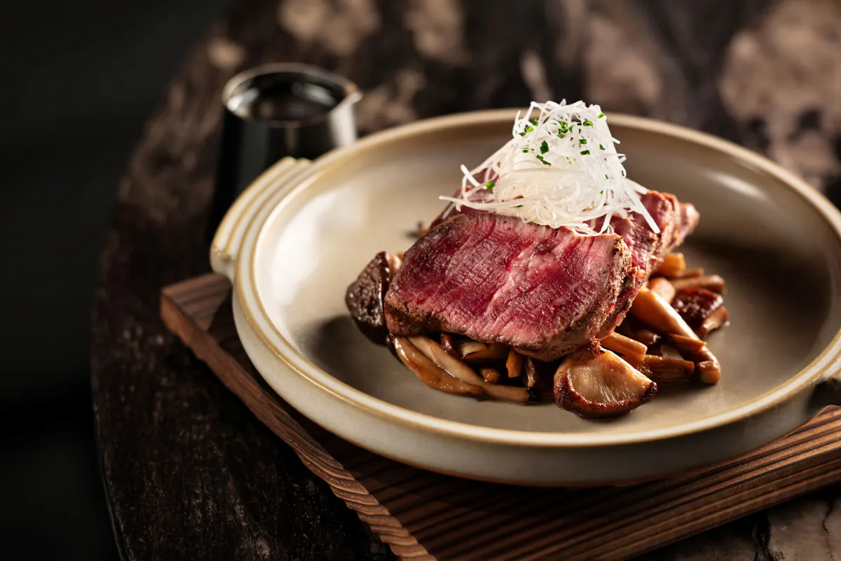 a plate of food on a wood surface