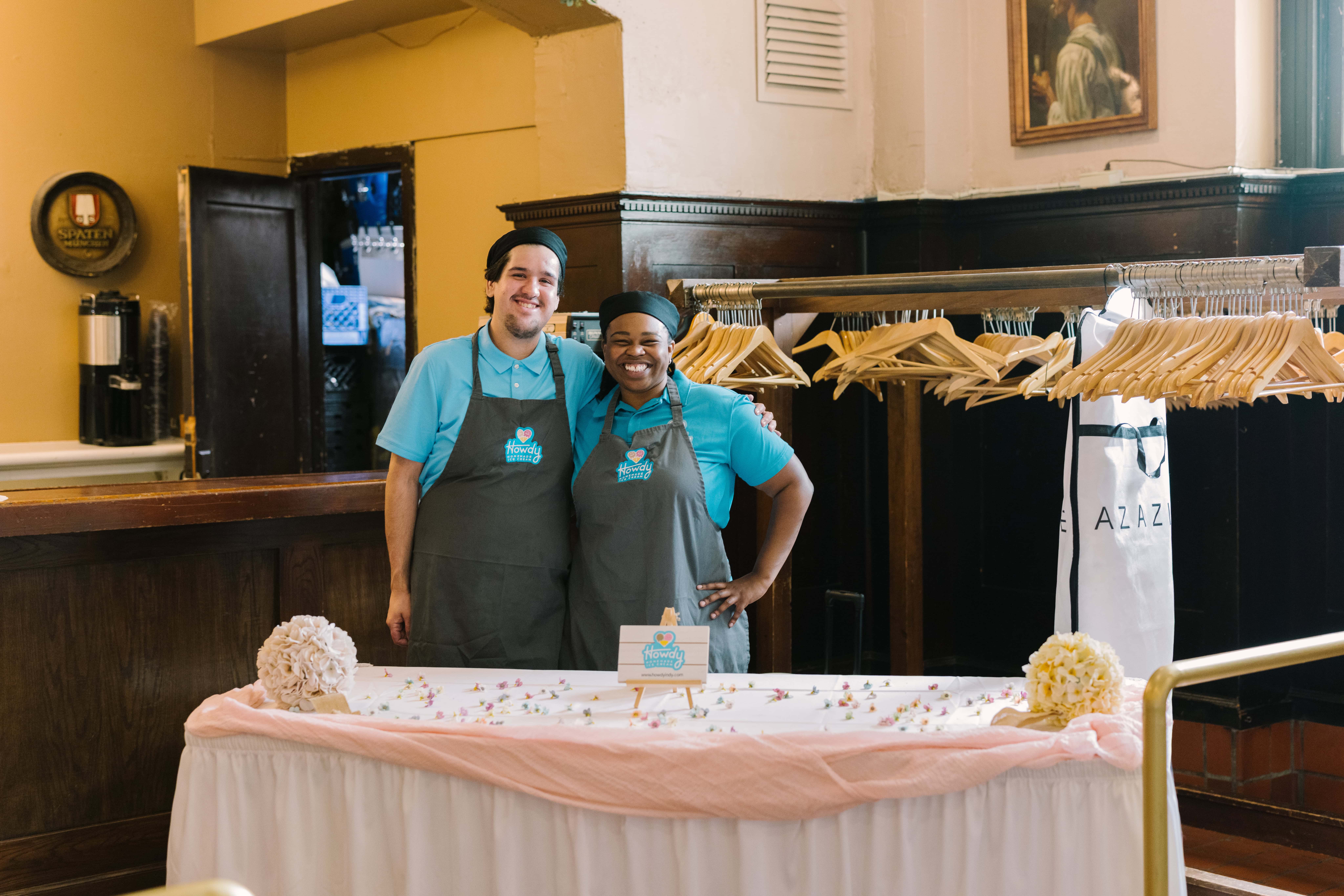 Bailey Wright standing in front of a cake