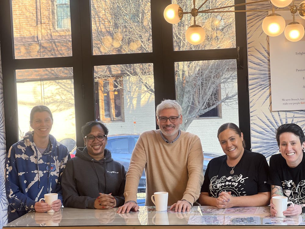 a group of people sitting at a table