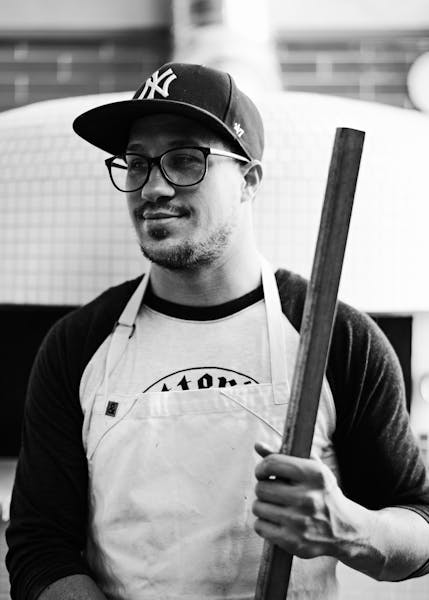 a man holding a baseball bat