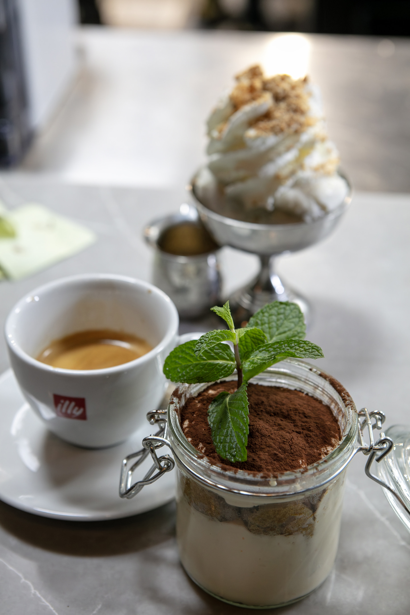 a plate of food and a cup of coffee