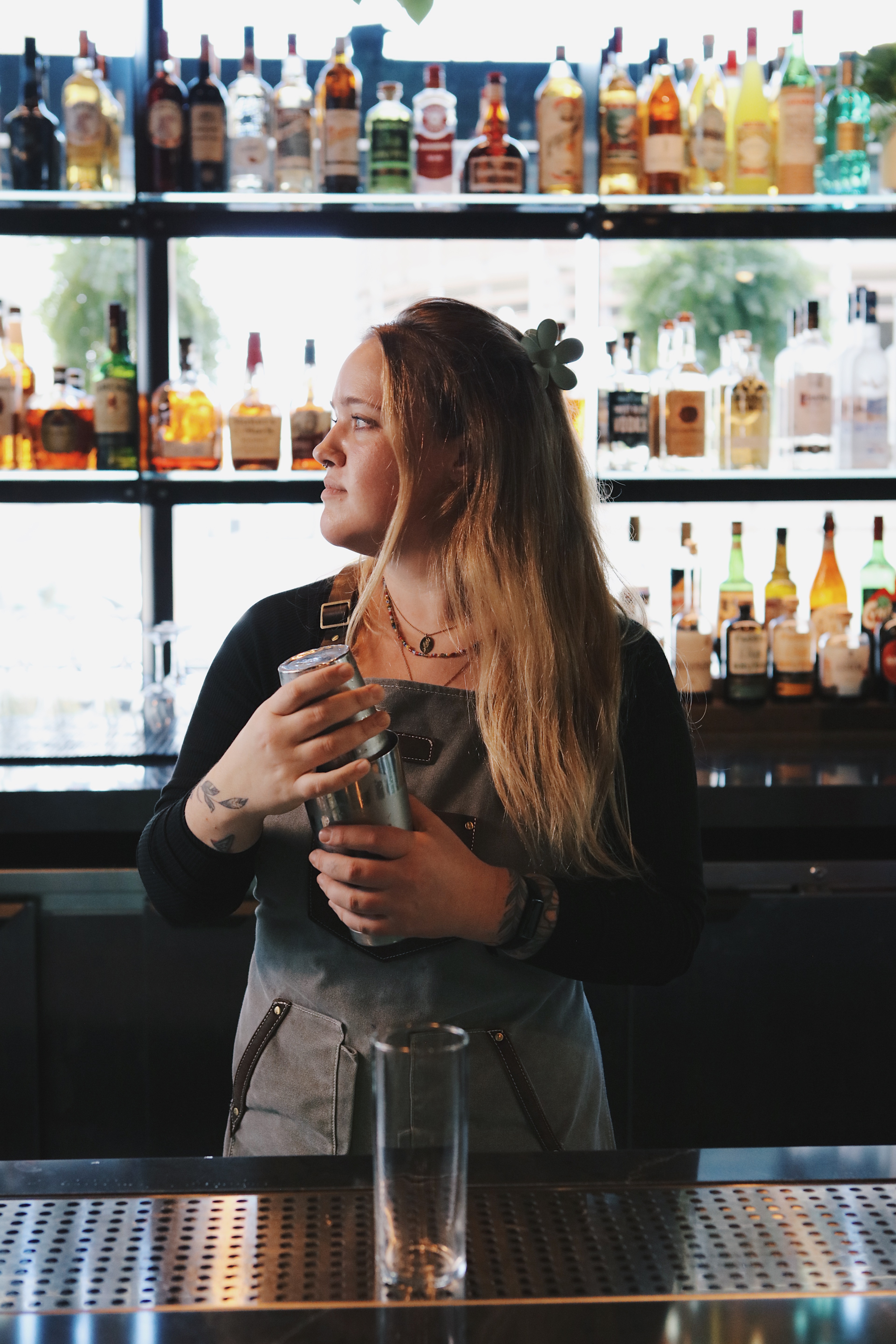 a person drinking a glass of wine