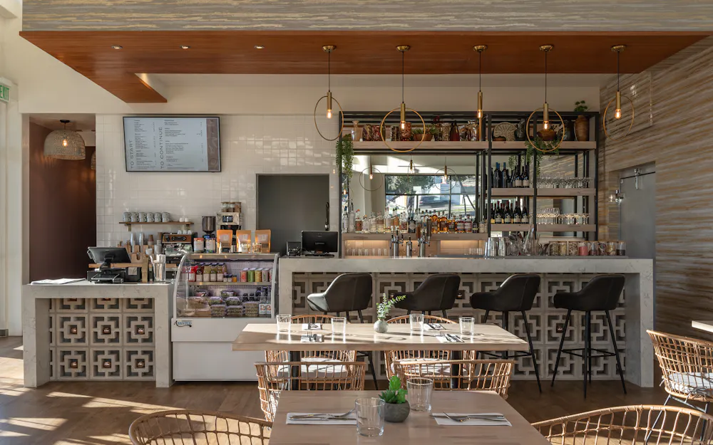 a restaurant with tables and chairs