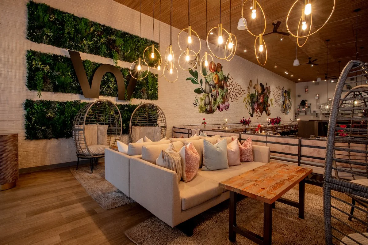 a room filled with furniture and a fireplace