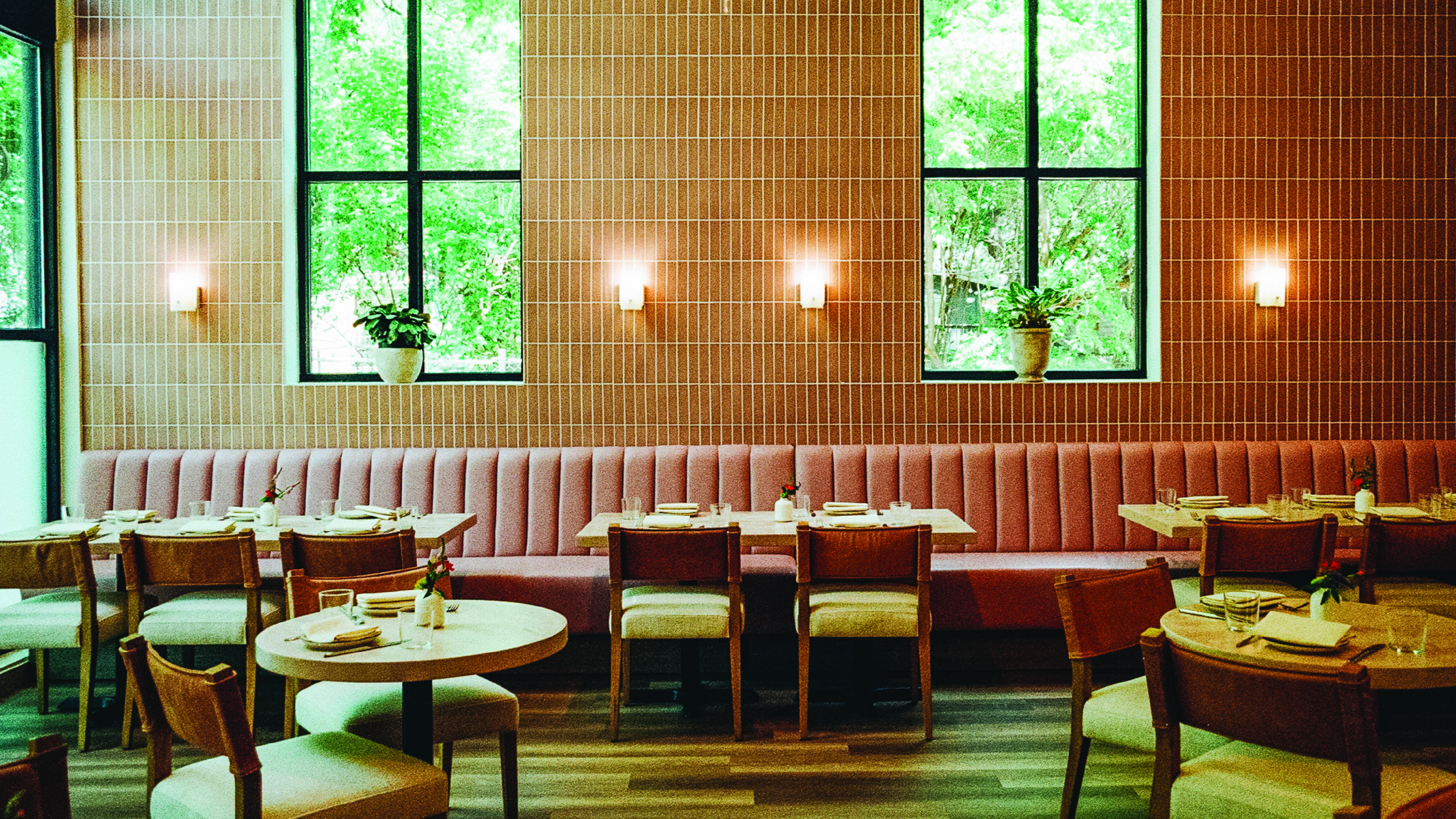 a restaurant with tables and chairs