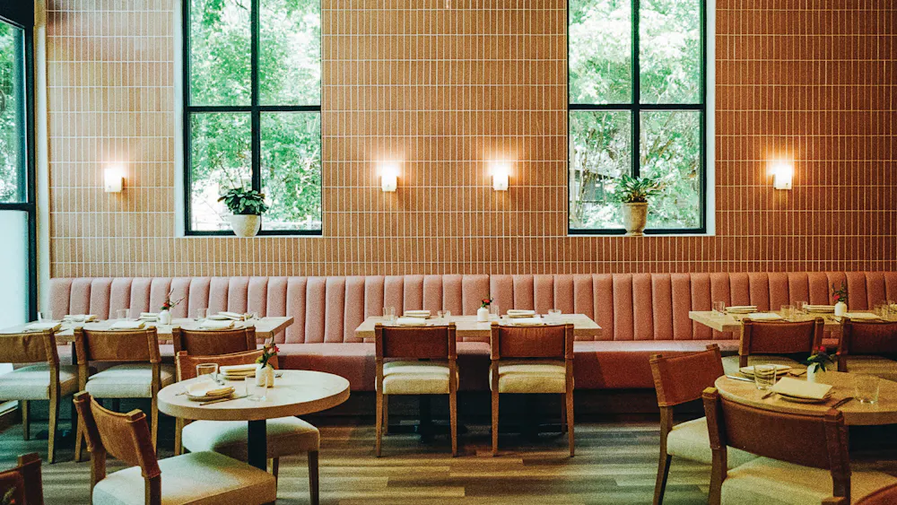 a restaurant with tables and chairs
