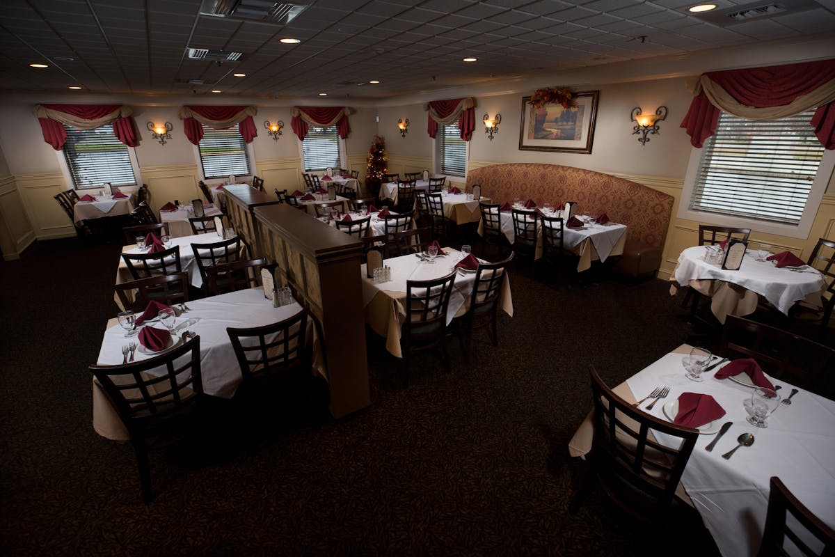 restaurant interior with tables and chairs