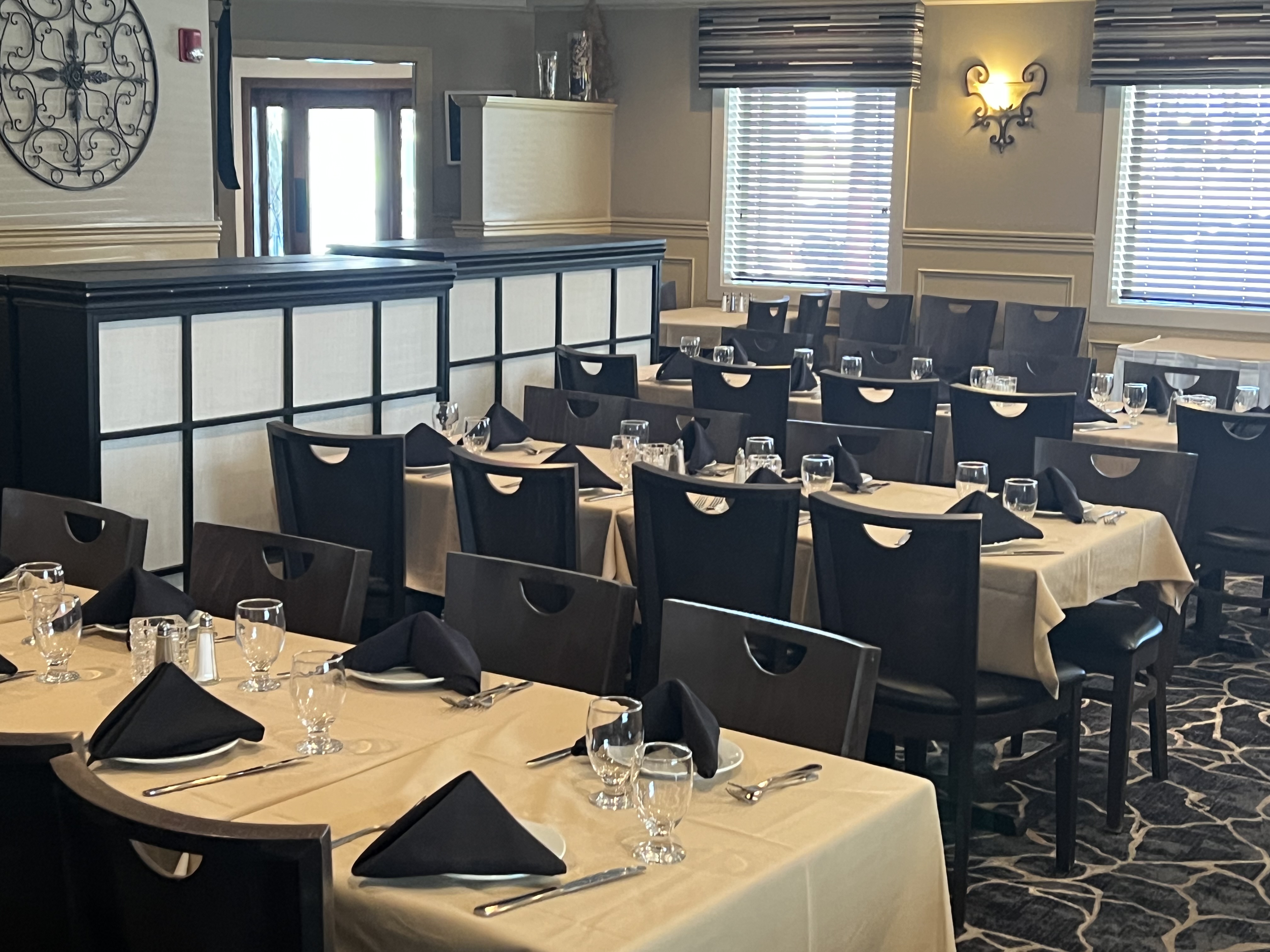 a room with tables and chairs