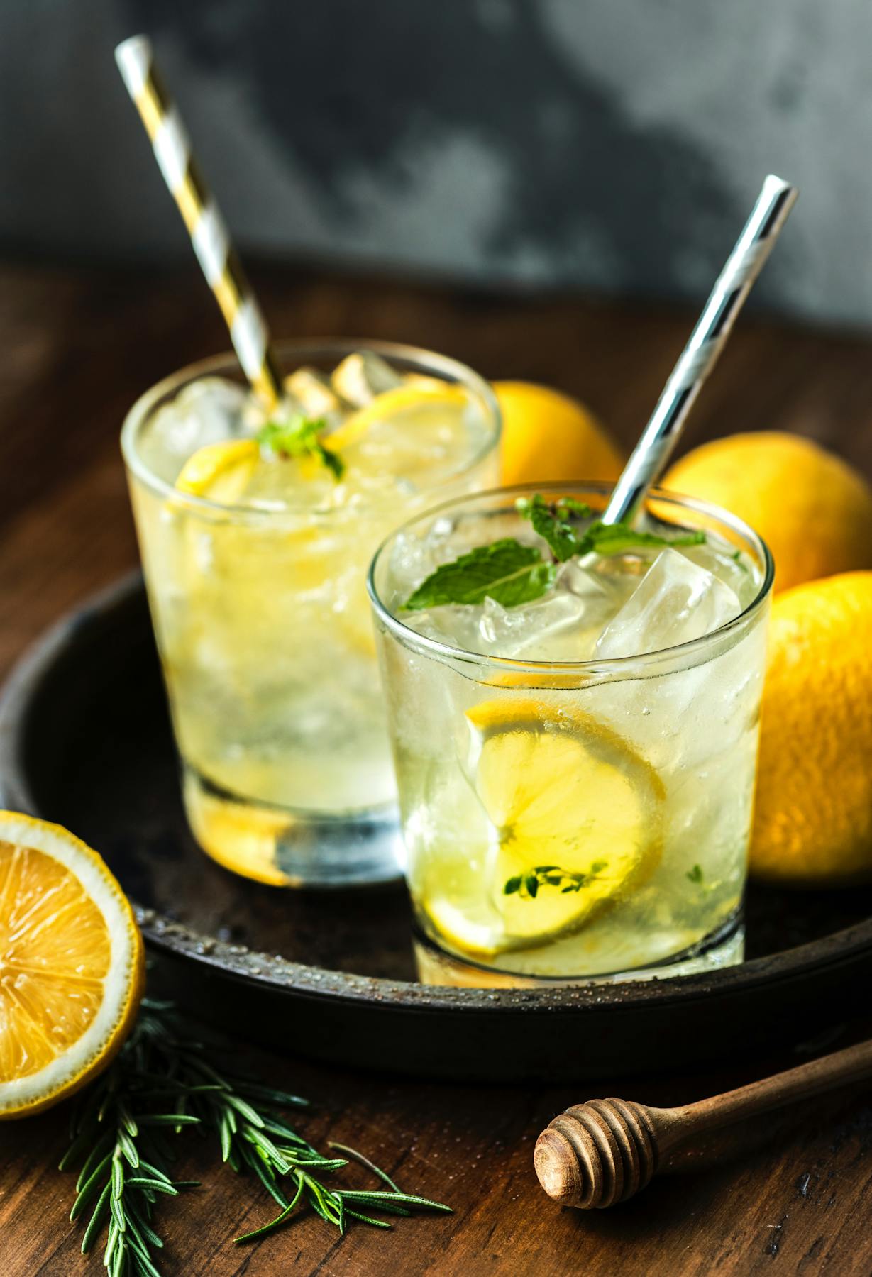 a glass of orange juice on a table