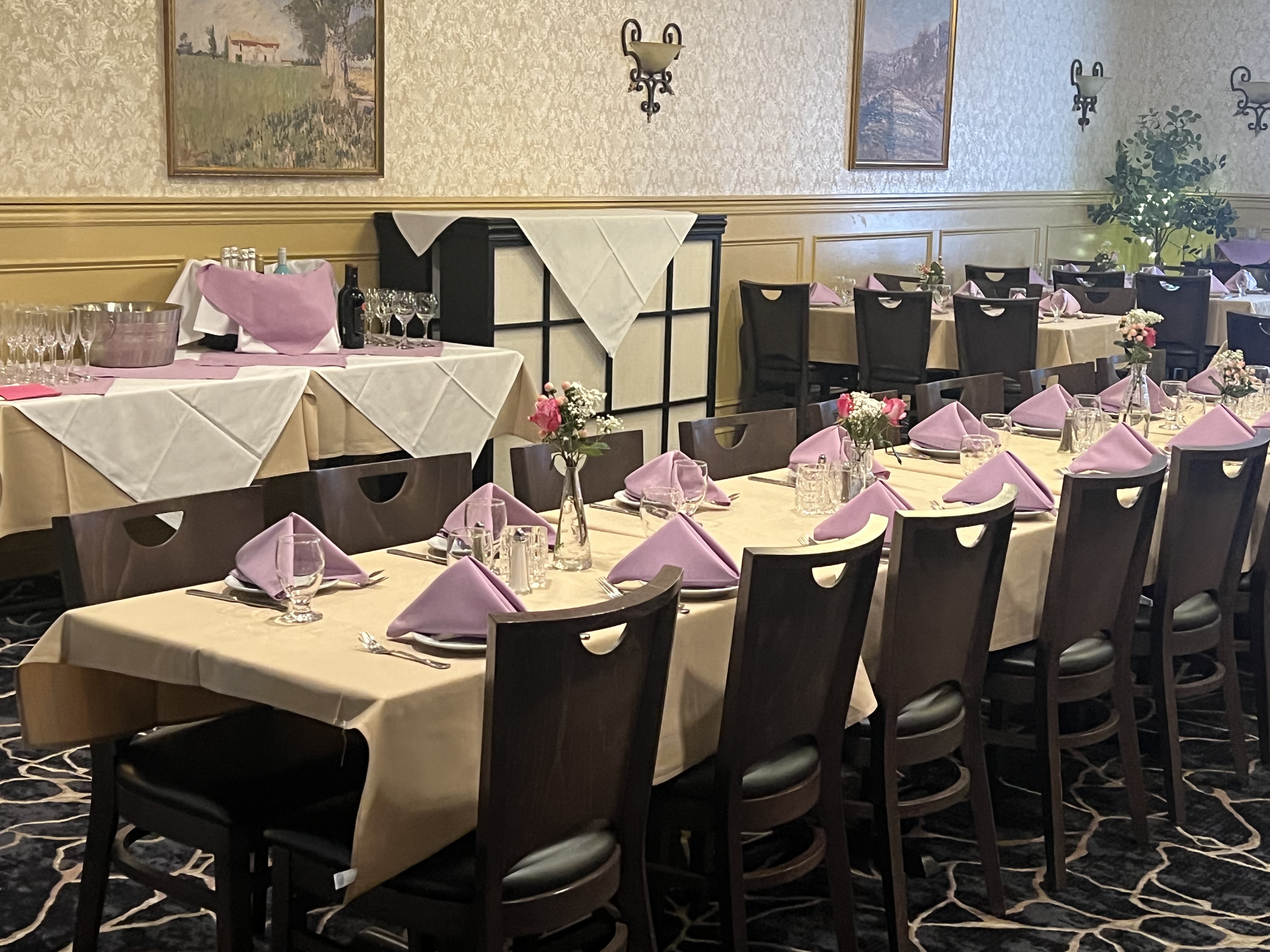 a room with tables and chairs
