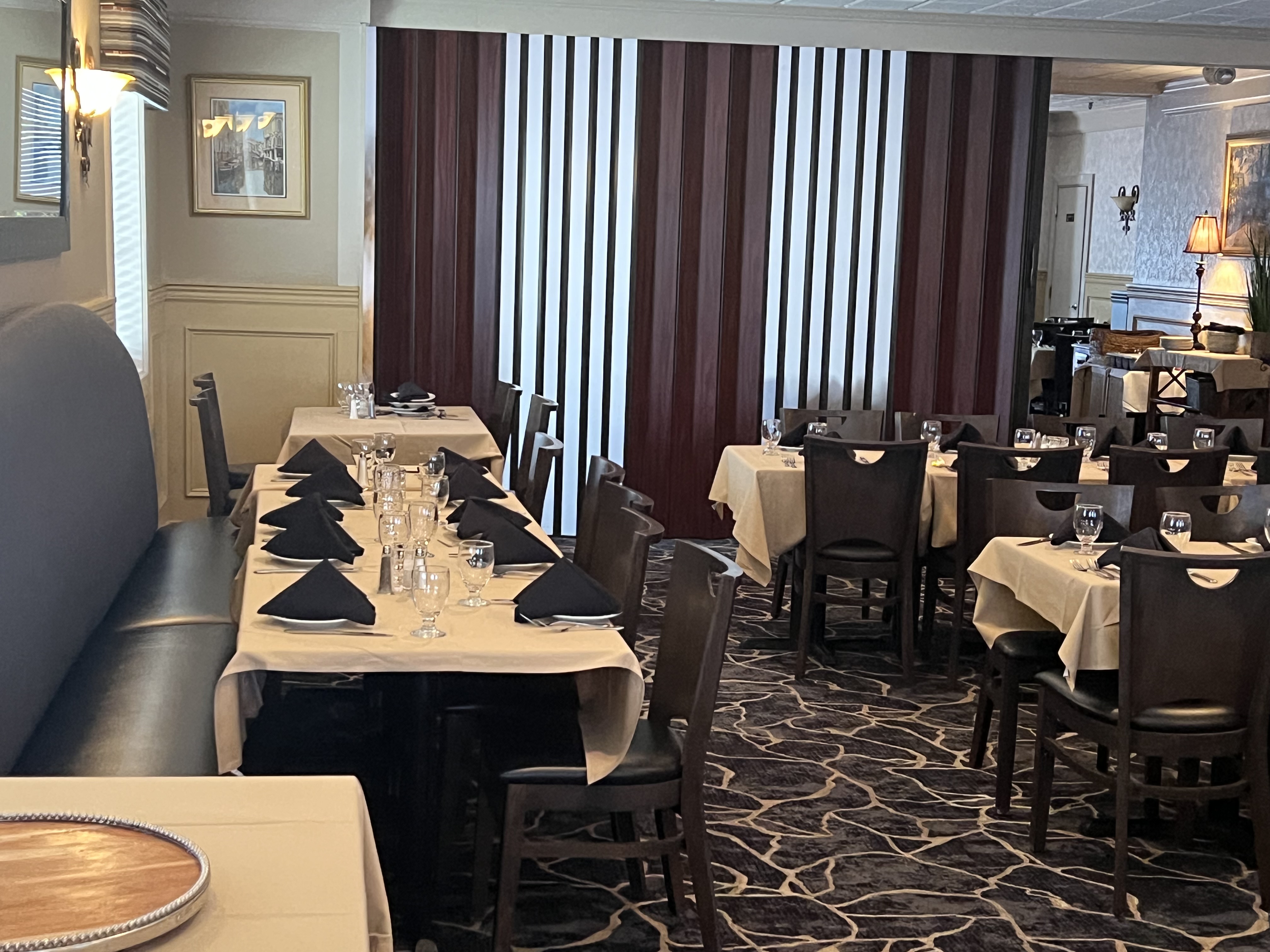 a room with tables and chairs