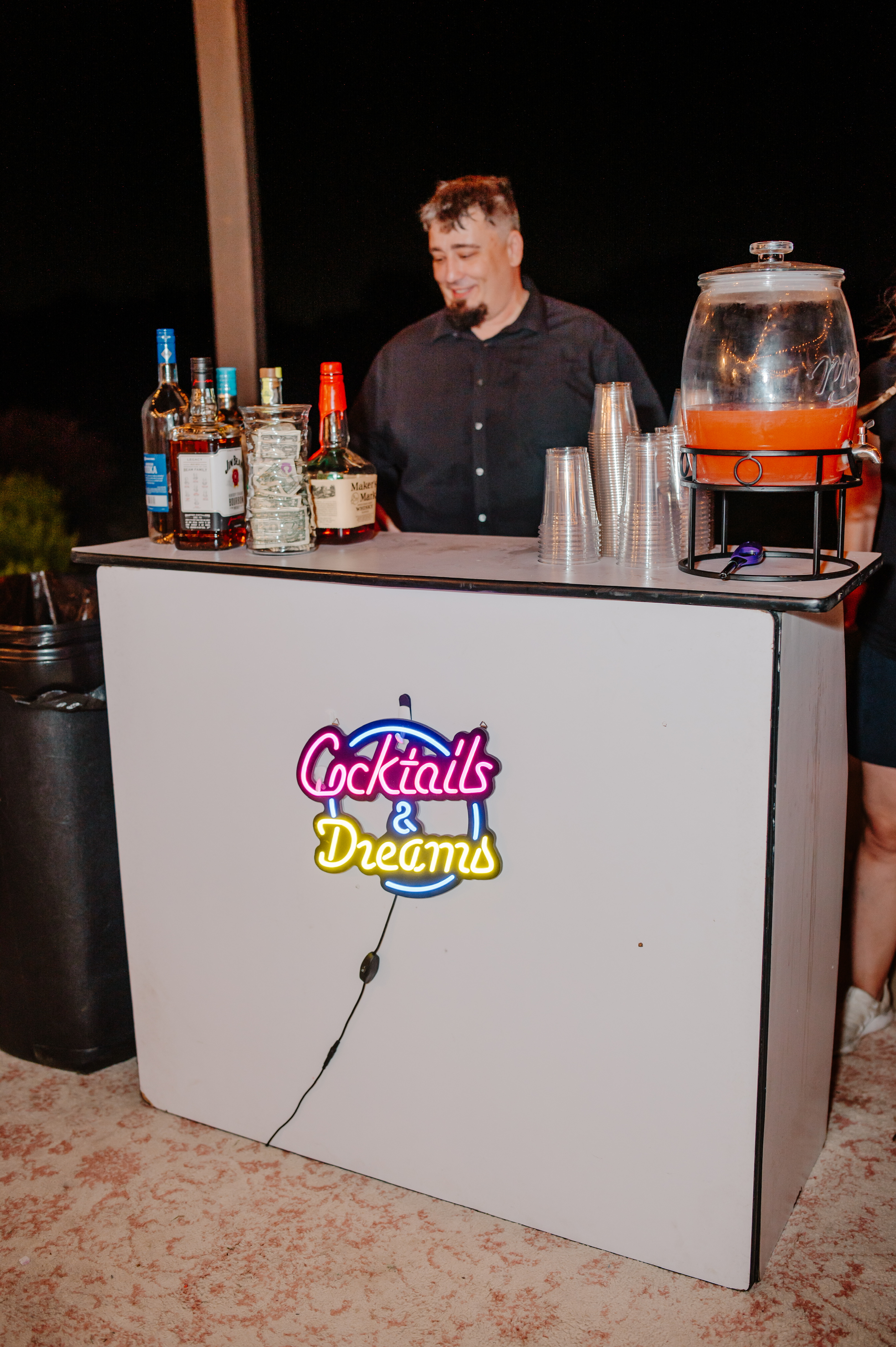 a man standing in front of a box