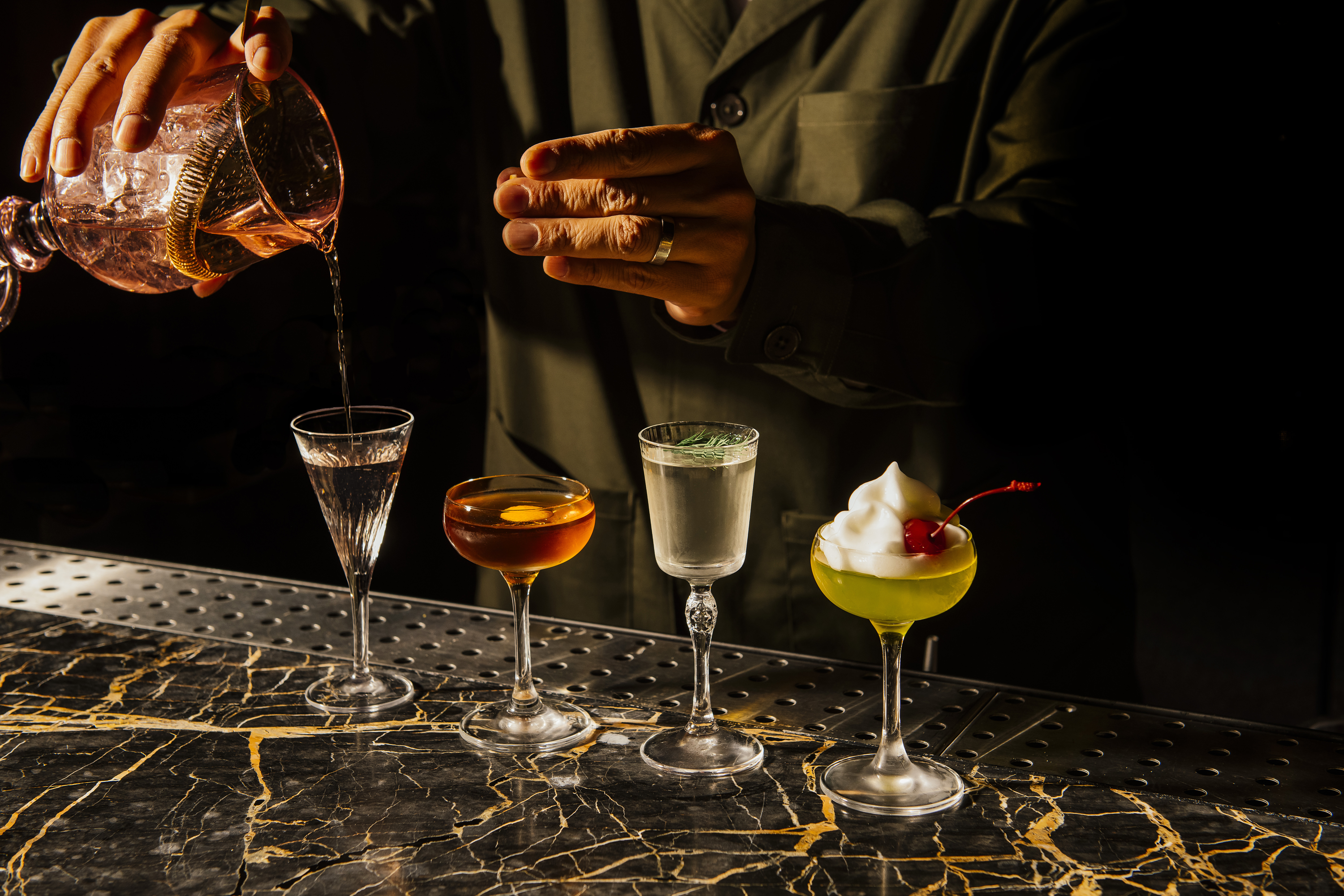 a glass of wine sitting on top of a table