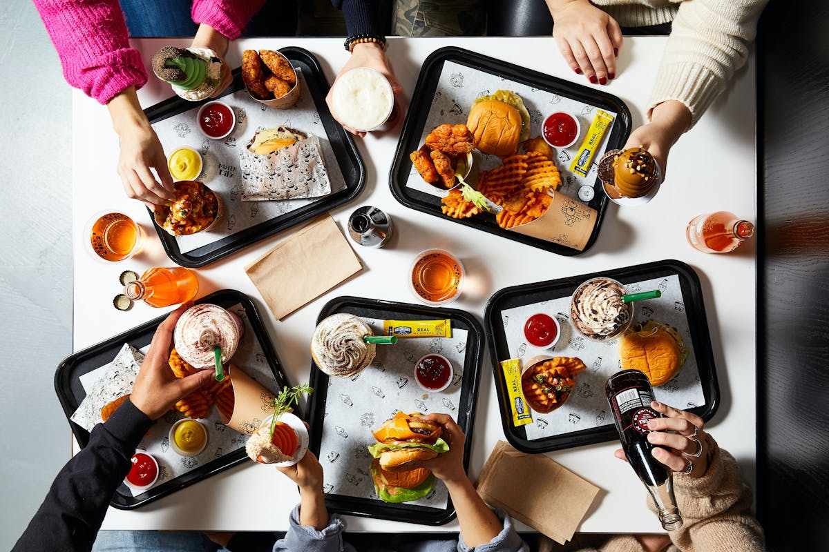 a bunch of different types of food on a table