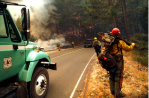 a truck that is driving down the road