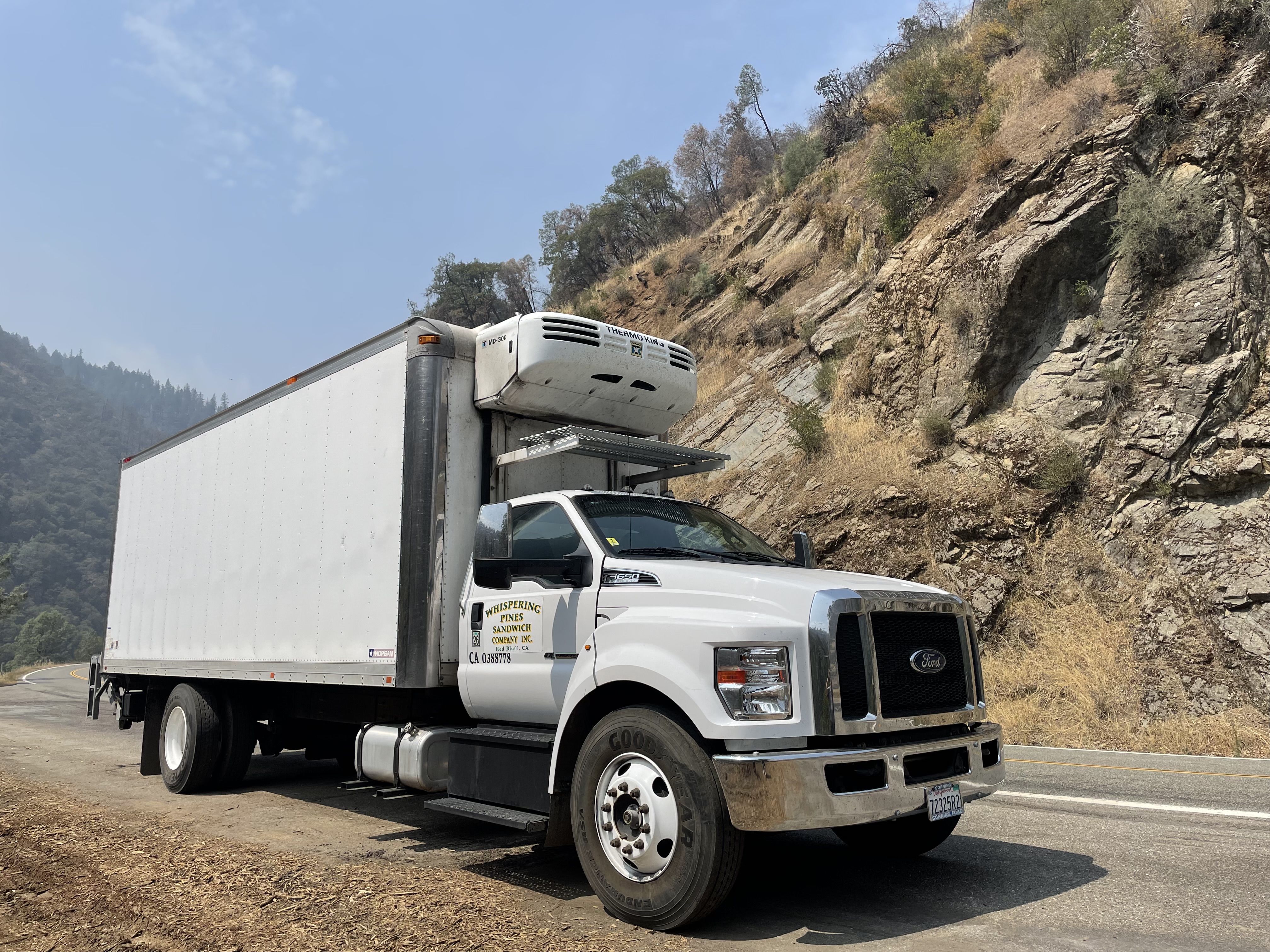 a truck is parked on the side of a road