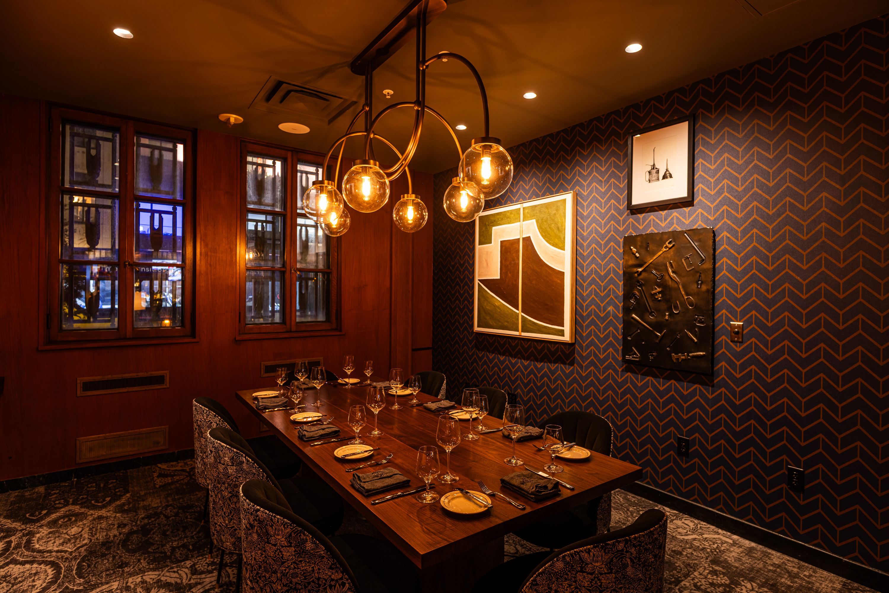 a room with a sink and a mirror