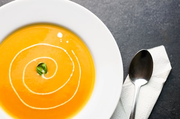 a bowl of butternut squash soup