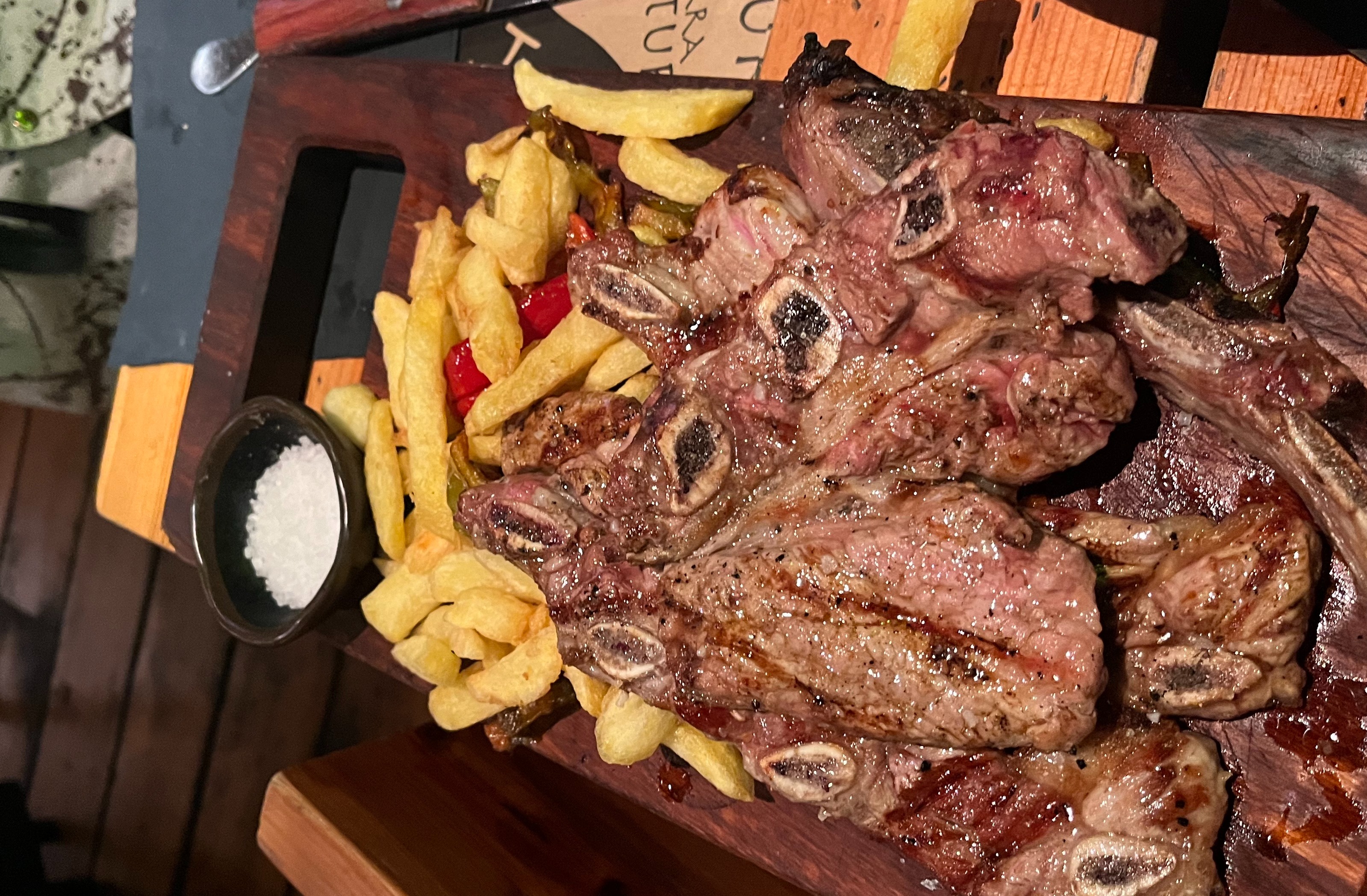 a plate of food on a wooden table