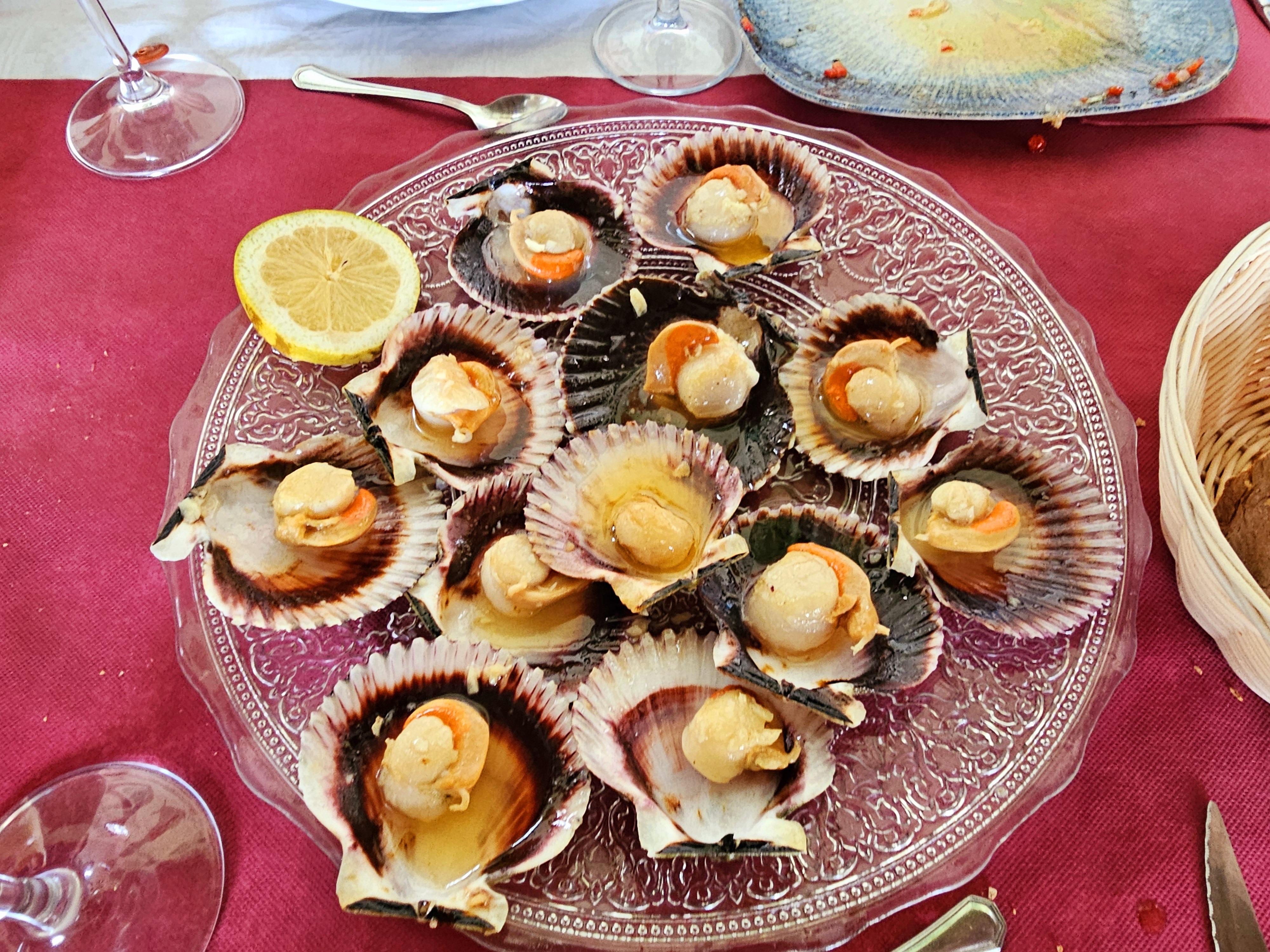 a table topped with plates of food on a plate