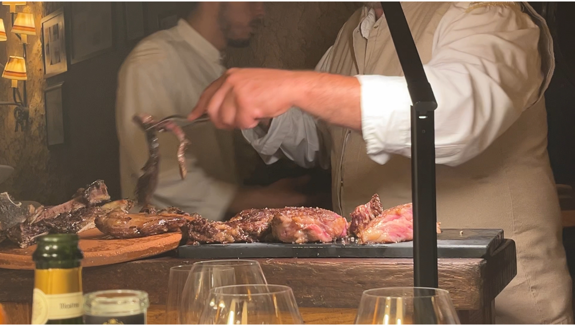 a person cooking in a kitchen preparing food