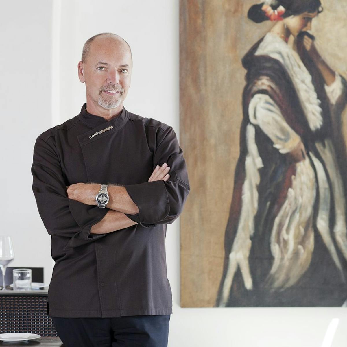 a man standing next to a woman