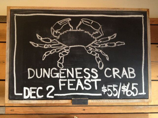 a blackboard sign on a wall