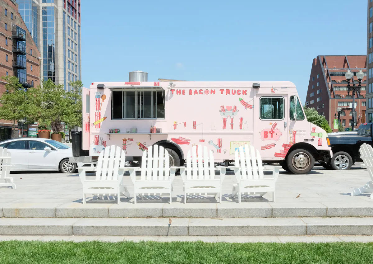 a truck is parked in front of a building