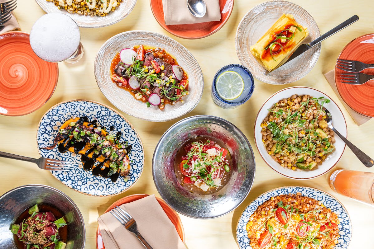 a table topped with different types of food on a plate