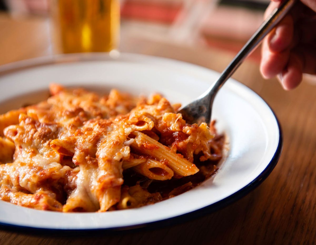 a close up of a plate of food with a fork