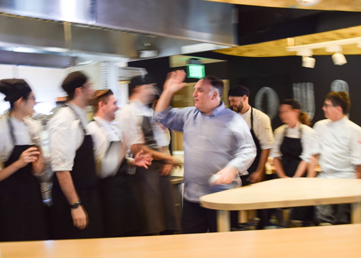 a group of people performing on a counter