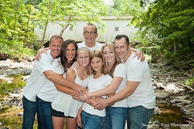 a group of people posing for a photo