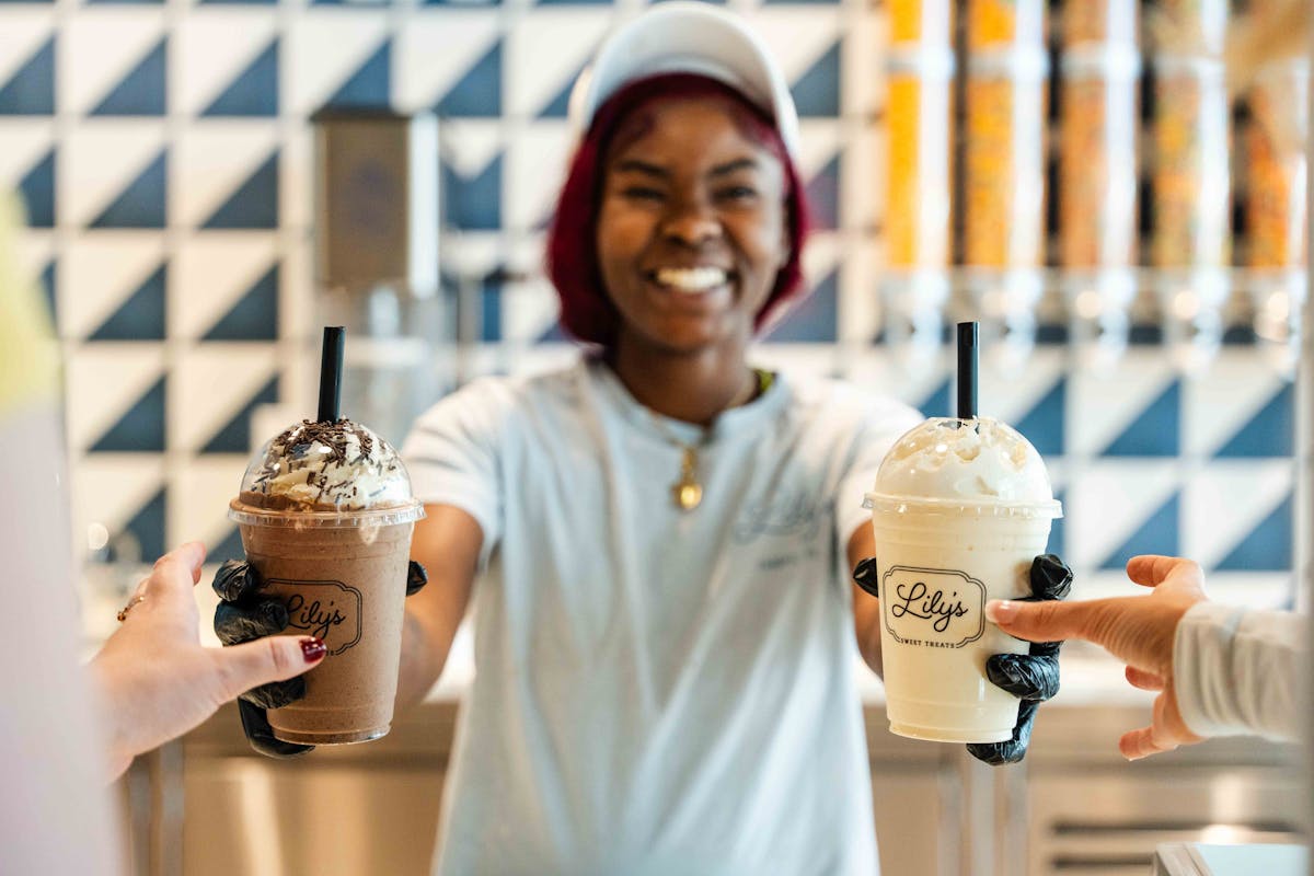 a person holding a cup