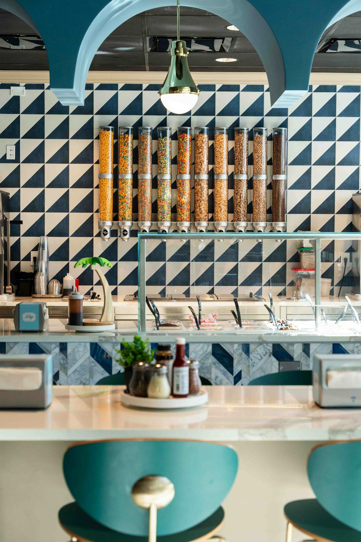 a chair sitting in front of a mirror